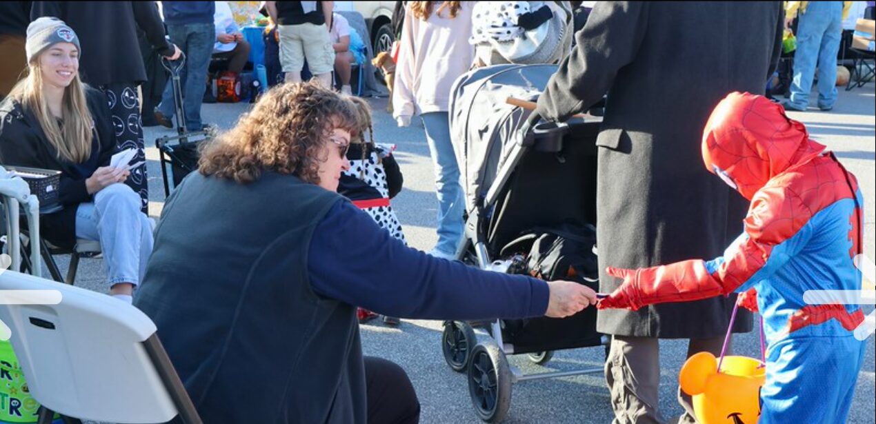 Employees of Associated Pediatricians, KidWorks, and the MAAC Foundation handed out goodies — stickers, goldfish crackers, glow sticks, and, of course, candy — to thousands of children.
